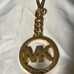 Authentic Michael Kors large bag charm. New.